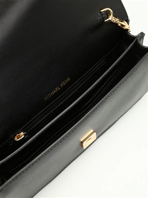 michael michael kors mott|Mott Leather Clutch .